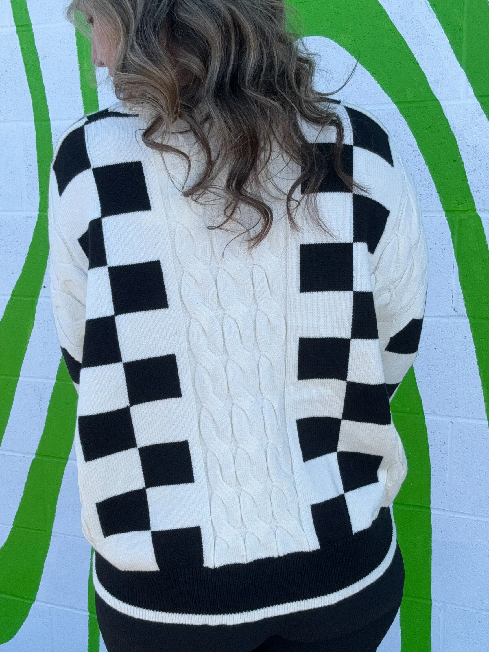 Black and Off-White Checkered Sweater