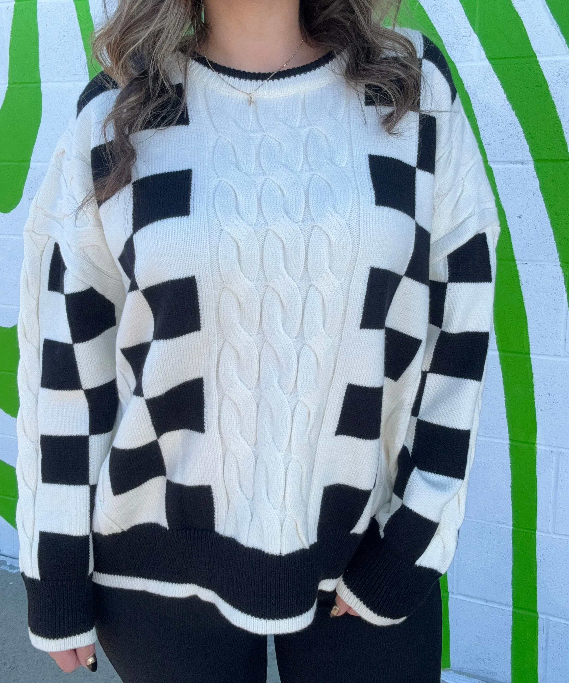 Black and Off-White Checkered Sweater